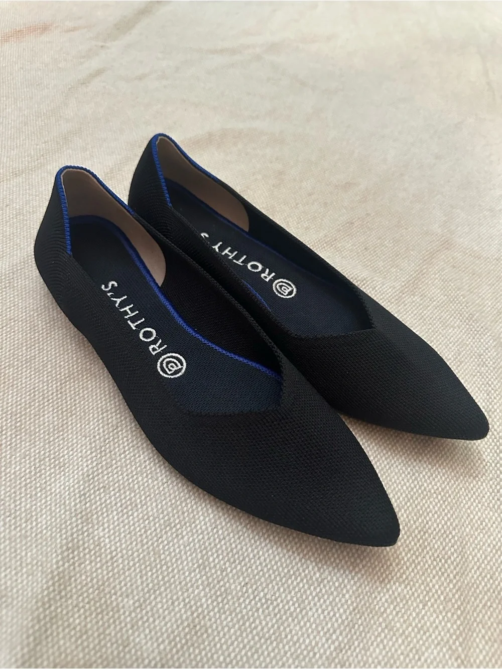 Rothy's Black Pointed Knit Flats with Blue Heel Trim